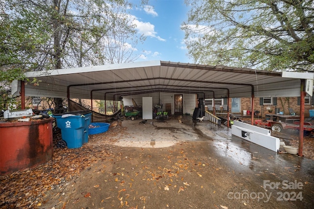 view of vehicle parking featuring a carport