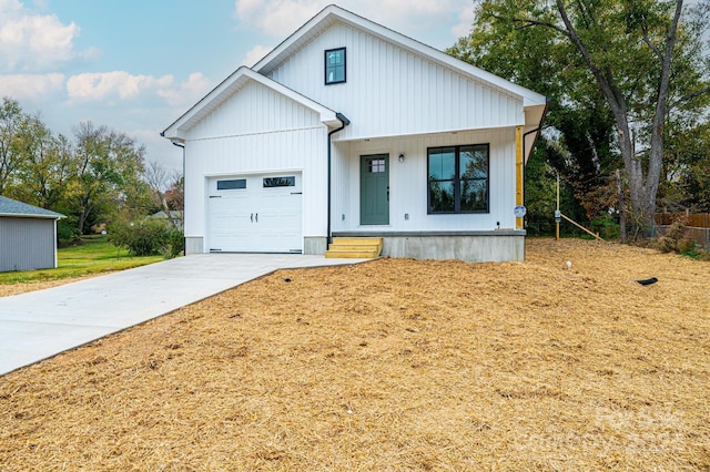 modern farmhouse with a garage