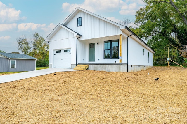 modern farmhouse style home with a garage