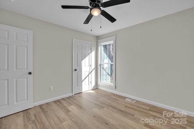 empty room featuring light wood-type flooring