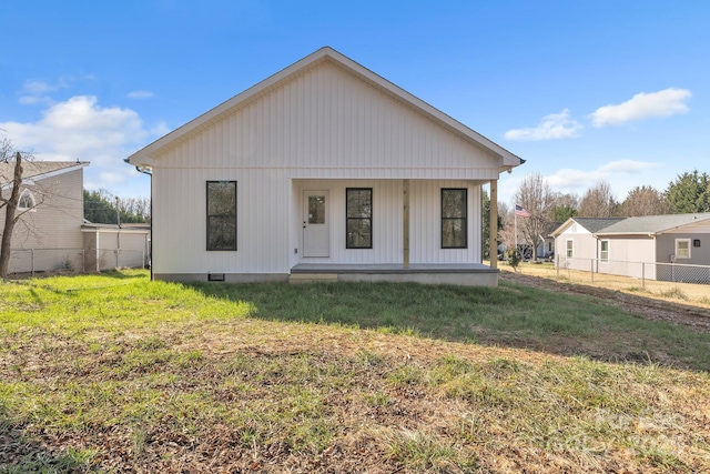 view of front facade with a porch and a front yard