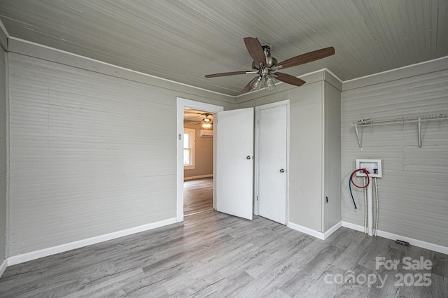 unfurnished bedroom featuring wood-type flooring and ceiling fan