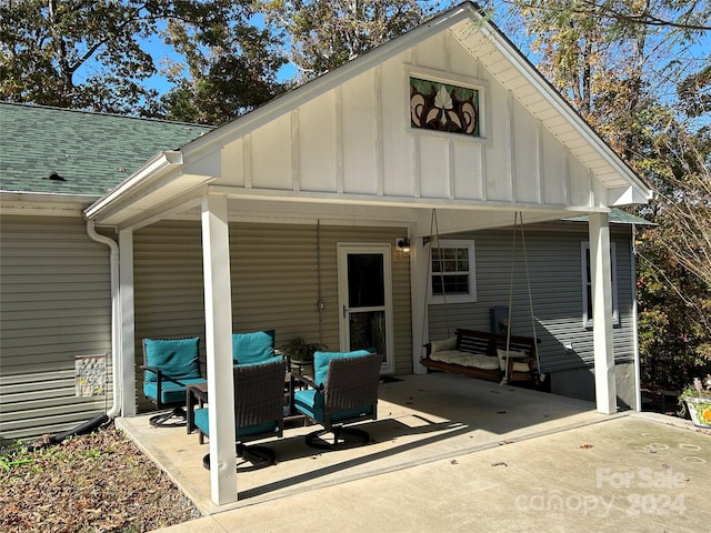 rear view of house featuring a patio