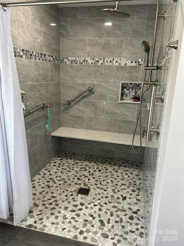 bathroom featuring walk in shower