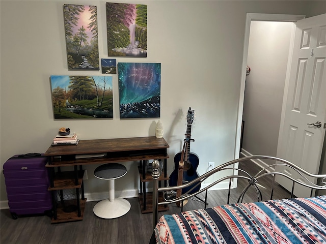 bedroom with wood-type flooring