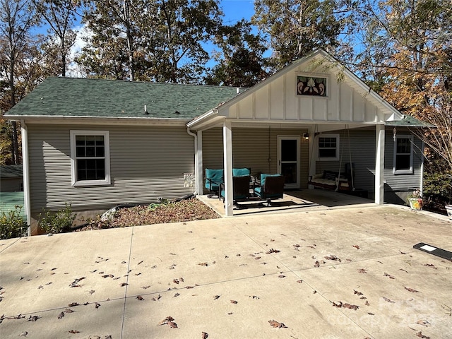 rear view of house featuring a patio