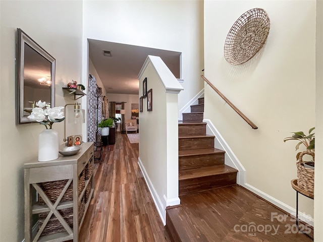 1096 Mountain Laurel Ct, Matthews, NC 28104 - foyer entrance featuring wood finished floors, stairway, and baseboards