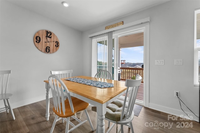 dining room featuring dark hardwood / wood-style flooring