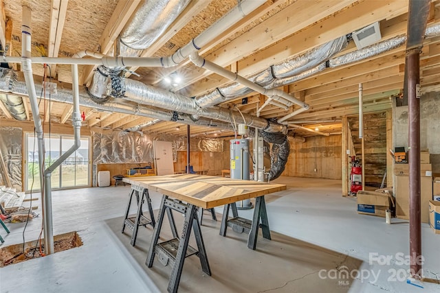 basement featuring electric water heater