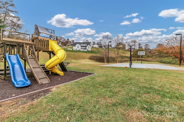 communal playground with a lawn