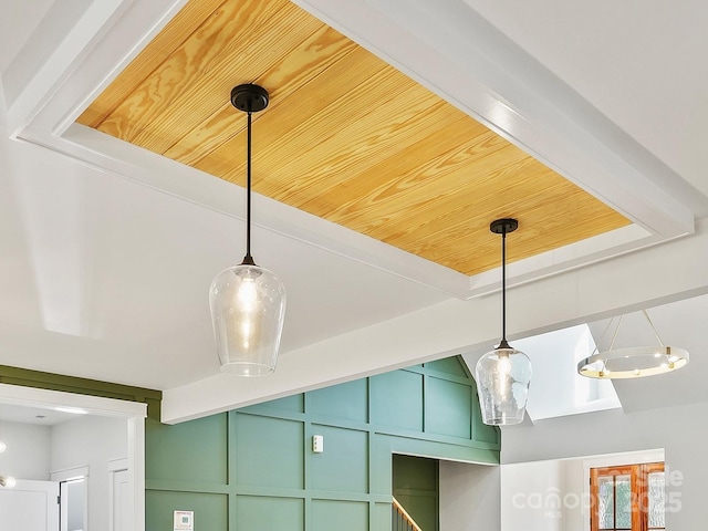 details featuring beamed ceiling and wooden ceiling