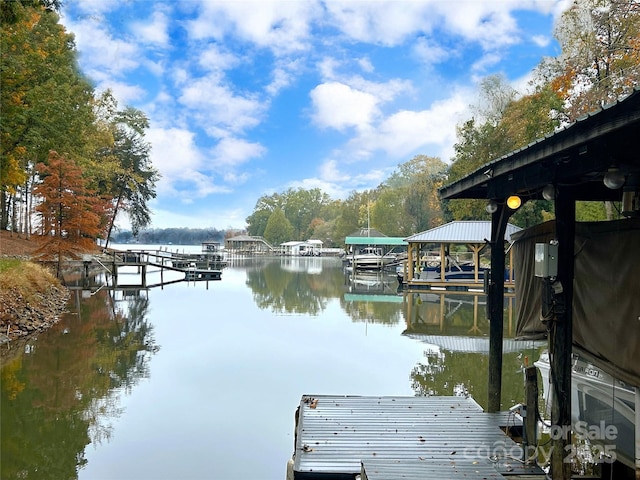 view of dock with a water view