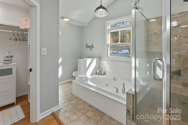 full bathroom with vanity, separate shower and tub, toilet, and ornamental molding