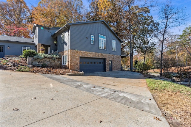 view of property exterior featuring a garage