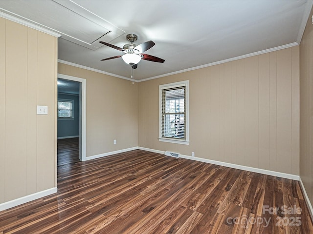 empty room with ceiling fan, crown molding, and dark hardwood / wood-style floors