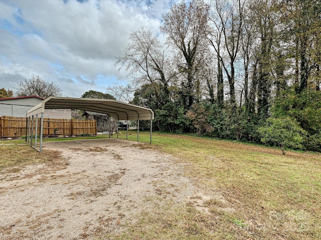 view of yard with a carport