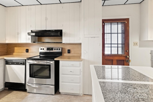 kitchen featuring white dishwasher, stainless steel range with electric stovetop, white cabinets, and tasteful backsplash