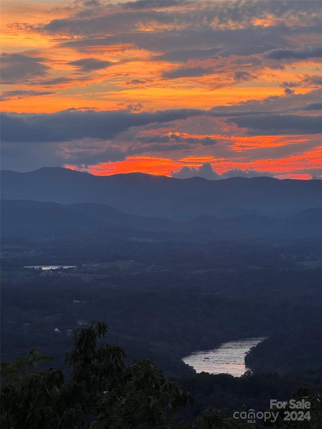 mountain view featuring a water view