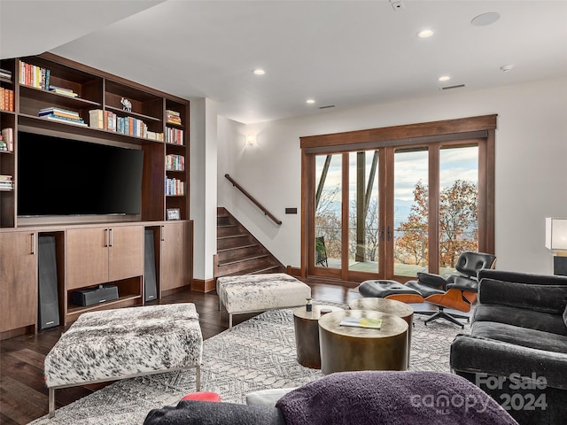 living room featuring dark hardwood / wood-style flooring