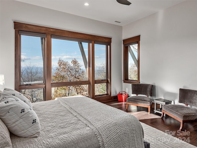 bedroom featuring wood-type flooring