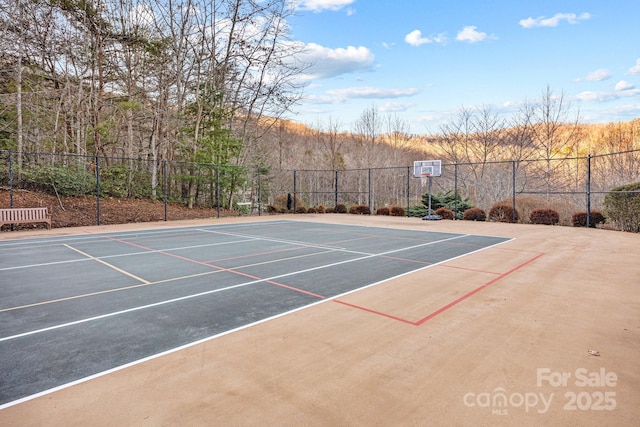 view of tennis court with basketball court