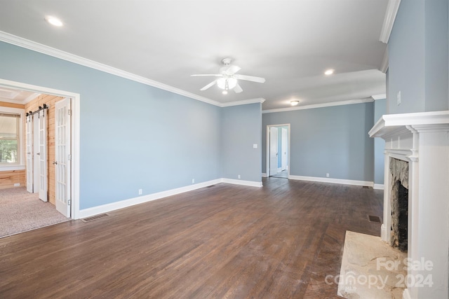 unfurnished living room with crown molding, dark hardwood / wood-style floors, and ceiling fan