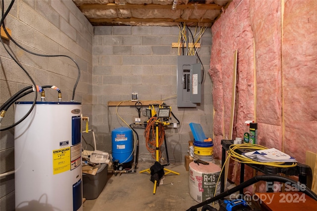 utility room with electric water heater and electric panel