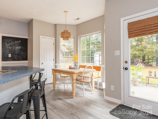 dining room featuring light hardwood / wood-style floors