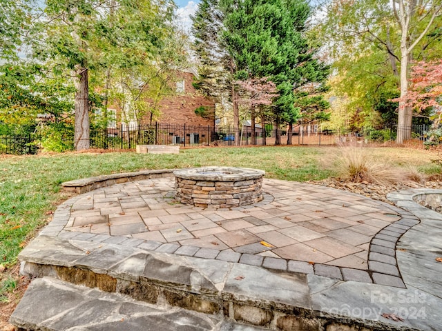 view of patio featuring a fire pit