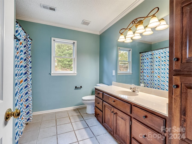 bathroom featuring a wealth of natural light, a textured ceiling, and ornamental molding