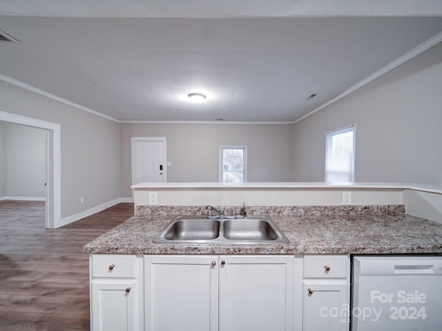 kitchen with white cabinetry, sink, dishwasher, crown molding, and hardwood / wood-style flooring