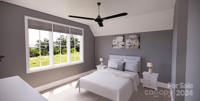 carpeted bedroom featuring lofted ceiling and ceiling fan