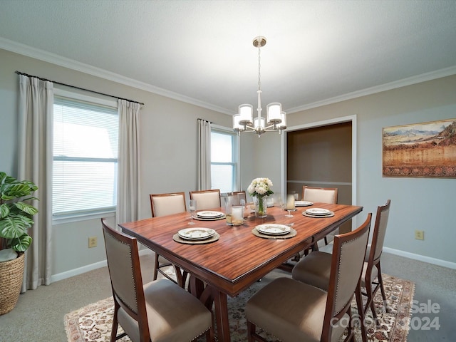 carpeted dining room featuring a wealth of natural light and ornamental molding