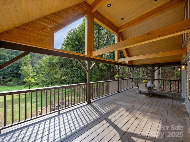 deck featuring outdoor dining area