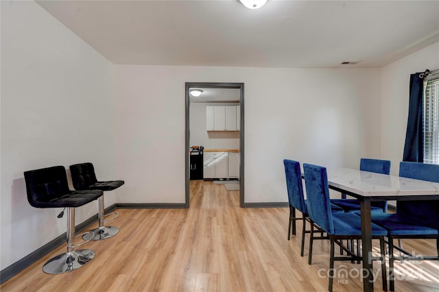 dining area featuring light hardwood / wood-style flooring