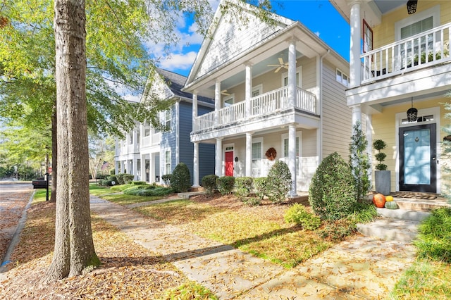 view of front of house featuring a balcony