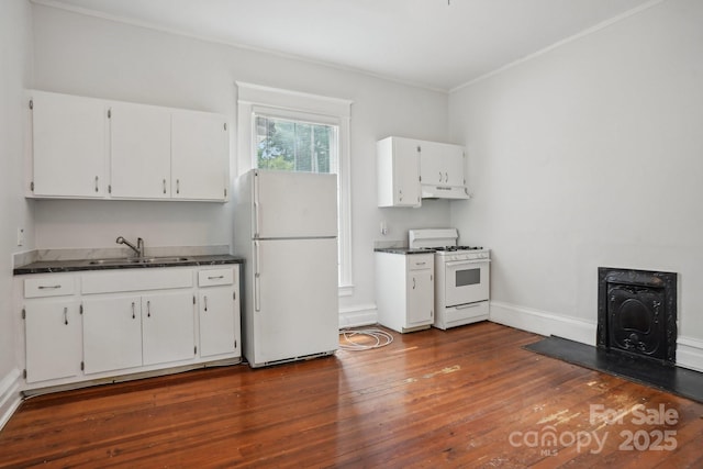 kitchen with sink, white appliances, crown molding, white cabinetry, and dark hardwood / wood-style flooring