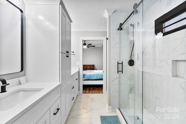 bathroom with hardwood / wood-style floors, vanity, ceiling fan, and a shower with shower door