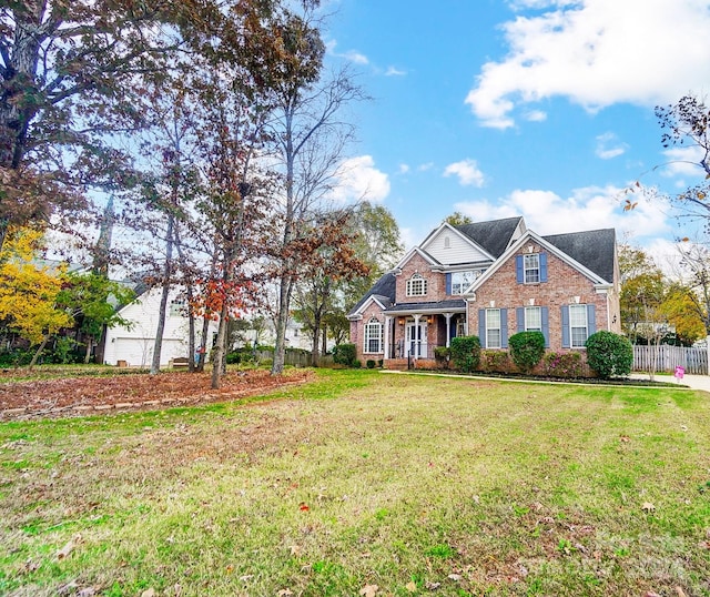 view of front of home with a front lawn