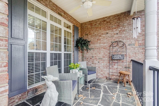 view of patio featuring covered porch and ceiling fan