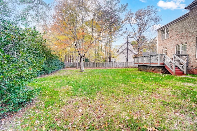 view of yard featuring a deck