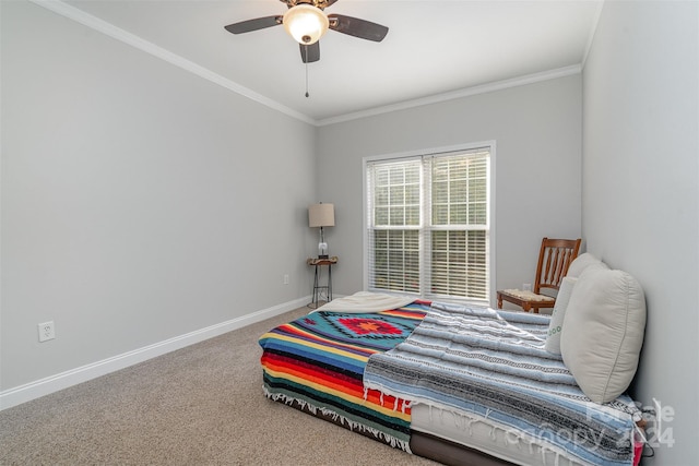 bedroom featuring ceiling fan, carpet flooring, and crown molding