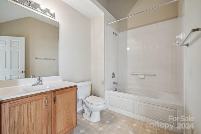 full bathroom with toilet, tiled shower / bath combo, and vanity