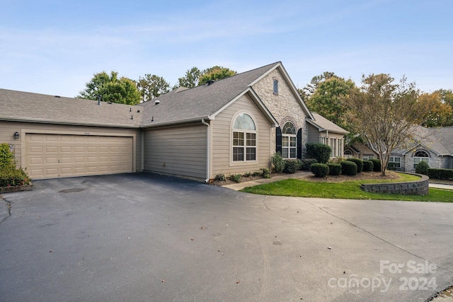 view of front of house with a garage