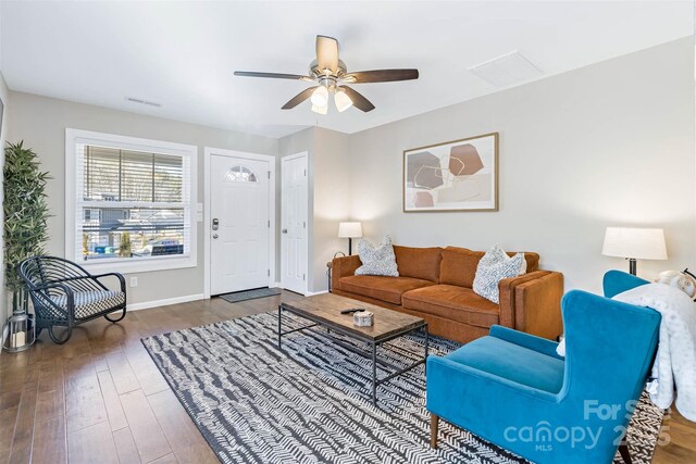 312 Jenna Clare Ln, Asheville, NC 28803 - living room featuring wood finished floors, a ceiling fan, and baseboards