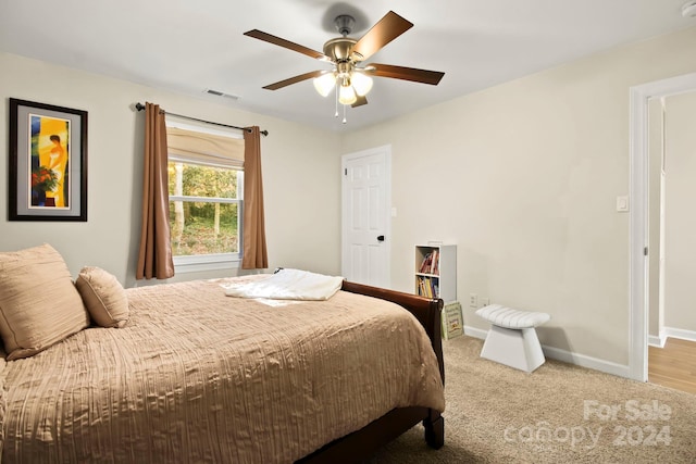 bedroom with carpet flooring and ceiling fan