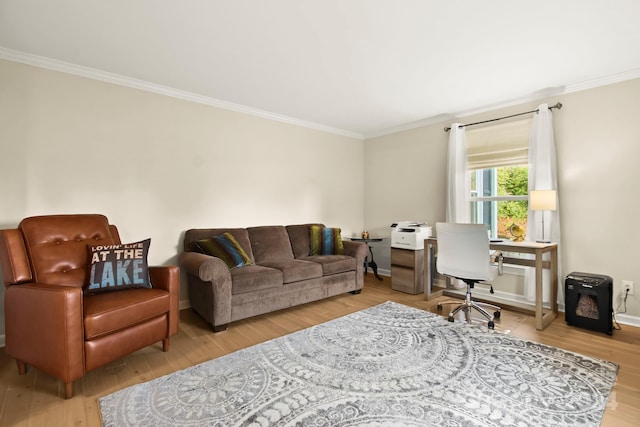 living room with light hardwood / wood-style flooring and crown molding