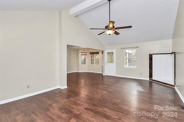 unfurnished living room featuring high vaulted ceiling, dark hardwood / wood-style flooring, beamed ceiling, and ceiling fan with notable chandelier