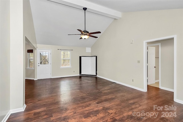 unfurnished living room with dark wood-type flooring, high vaulted ceiling, ceiling fan, and beam ceiling