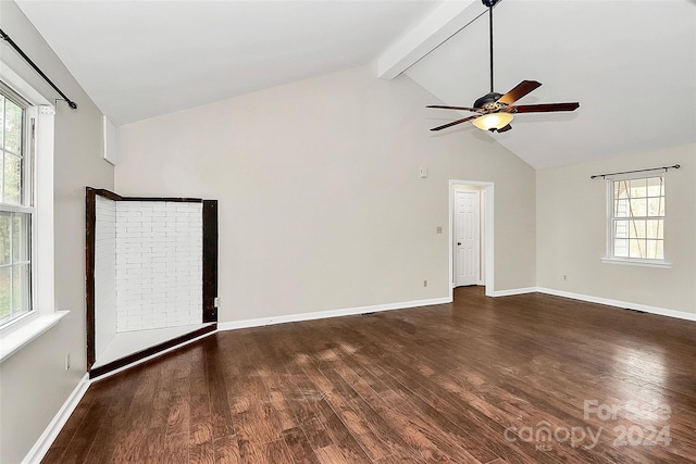 spare room with dark hardwood / wood-style floors and plenty of natural light